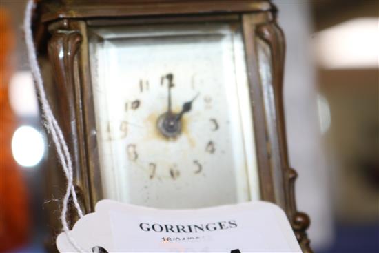 A small ornate gilt brass carriage timepiece height 9cm (a.f.)